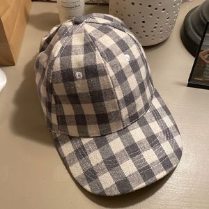 White and blue checkered baseball hat